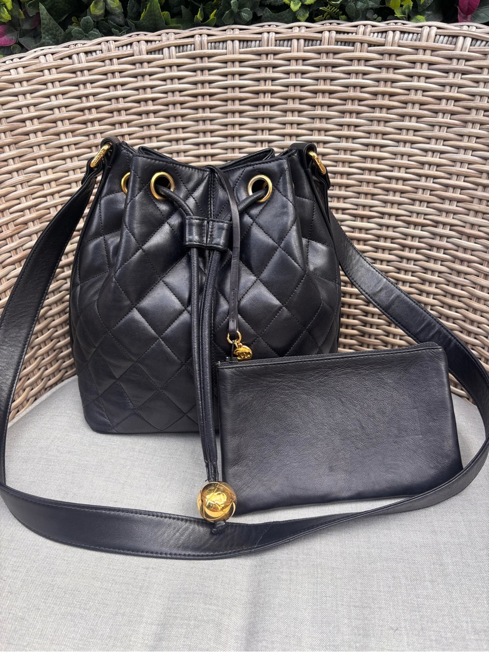 Authentic CHANEL black quilted lambskin leather bucket drawstring with pouch